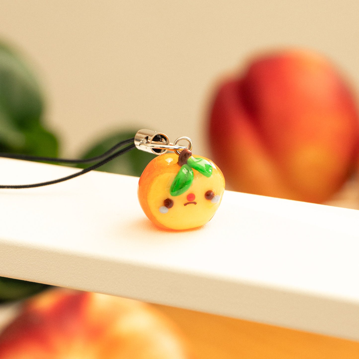 Apple Crybaby Phone Charm